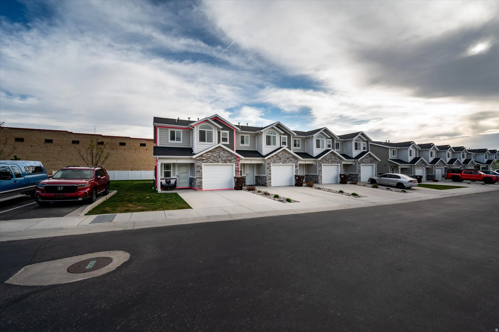 View of exterior Townhomes with #1 end unit highlighted.