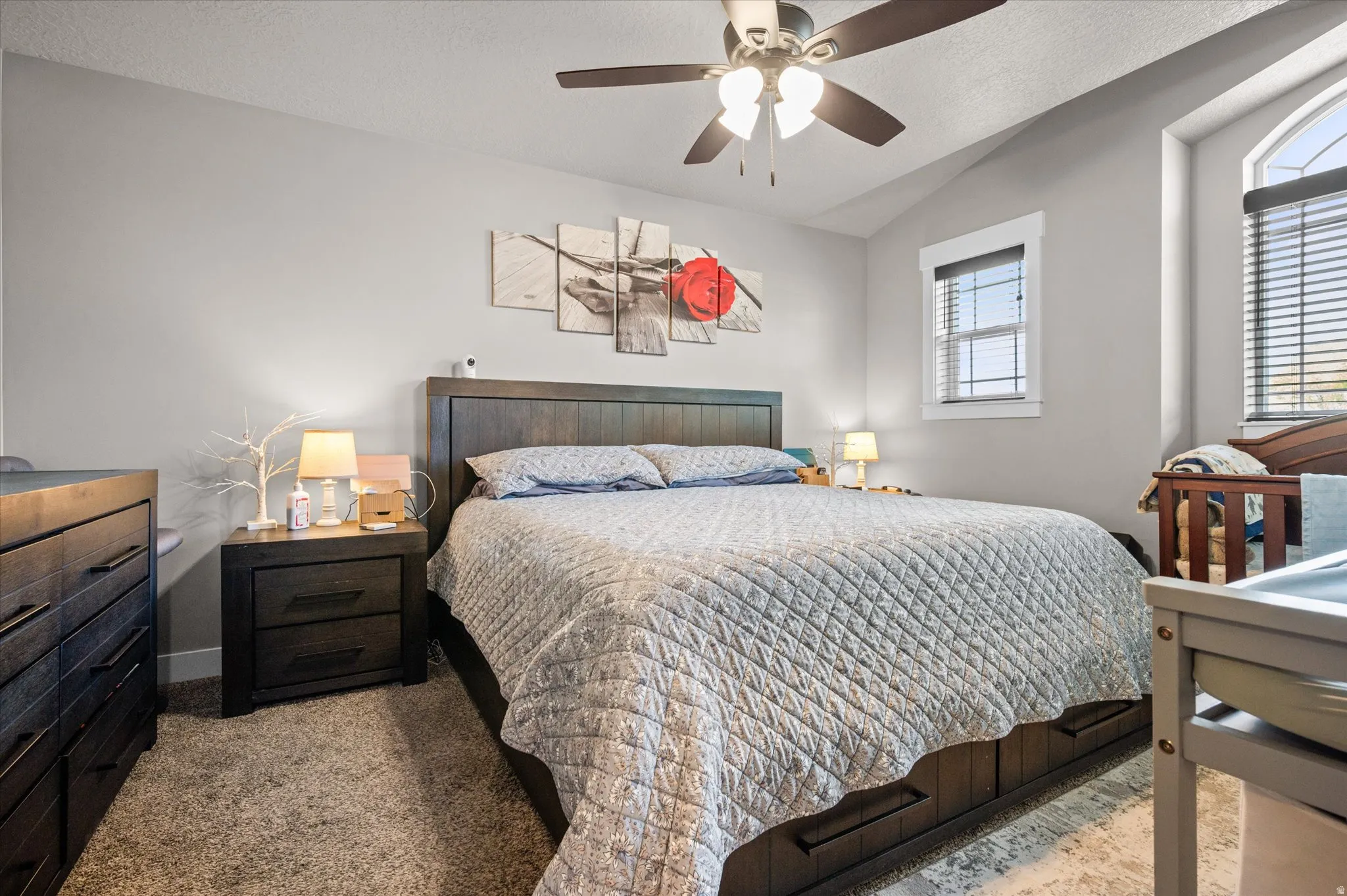 Owner's suite featuring lots of natural light and walk in closet.