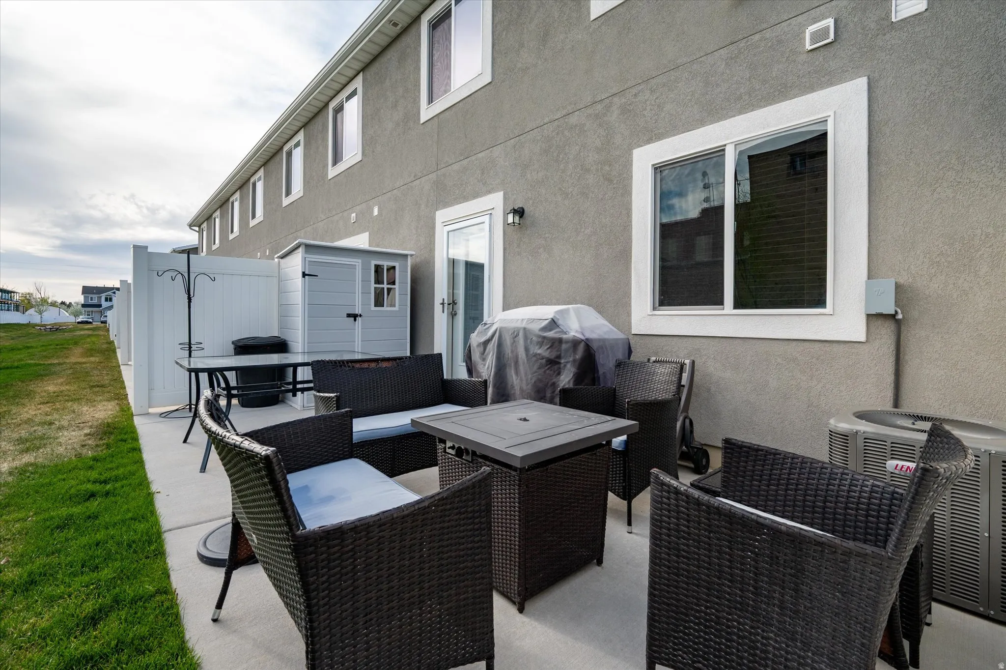 View of patio / terrace featuring an outdoor lounge area and a grill.