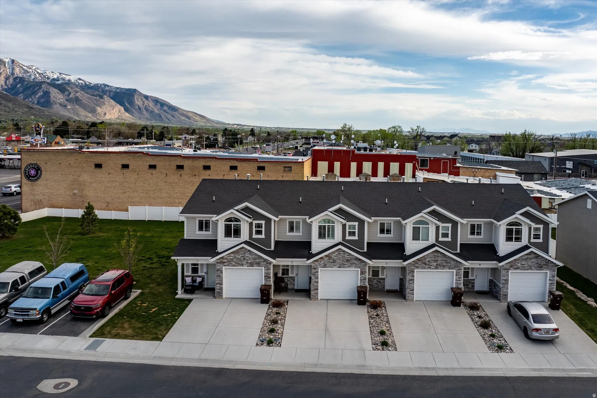 Aerial view of Townhomes and mountains.