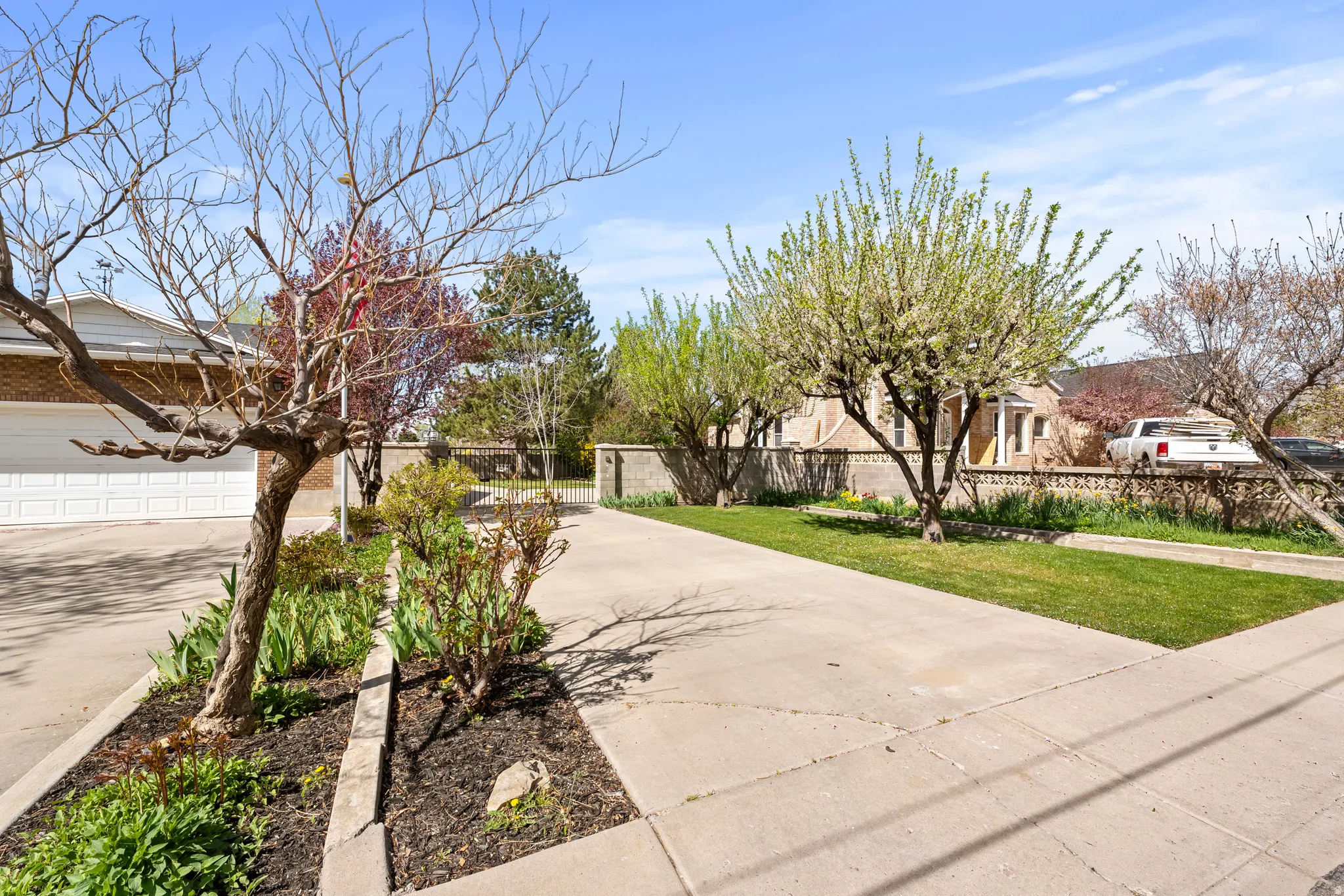 View of concrete driveway with a residential view