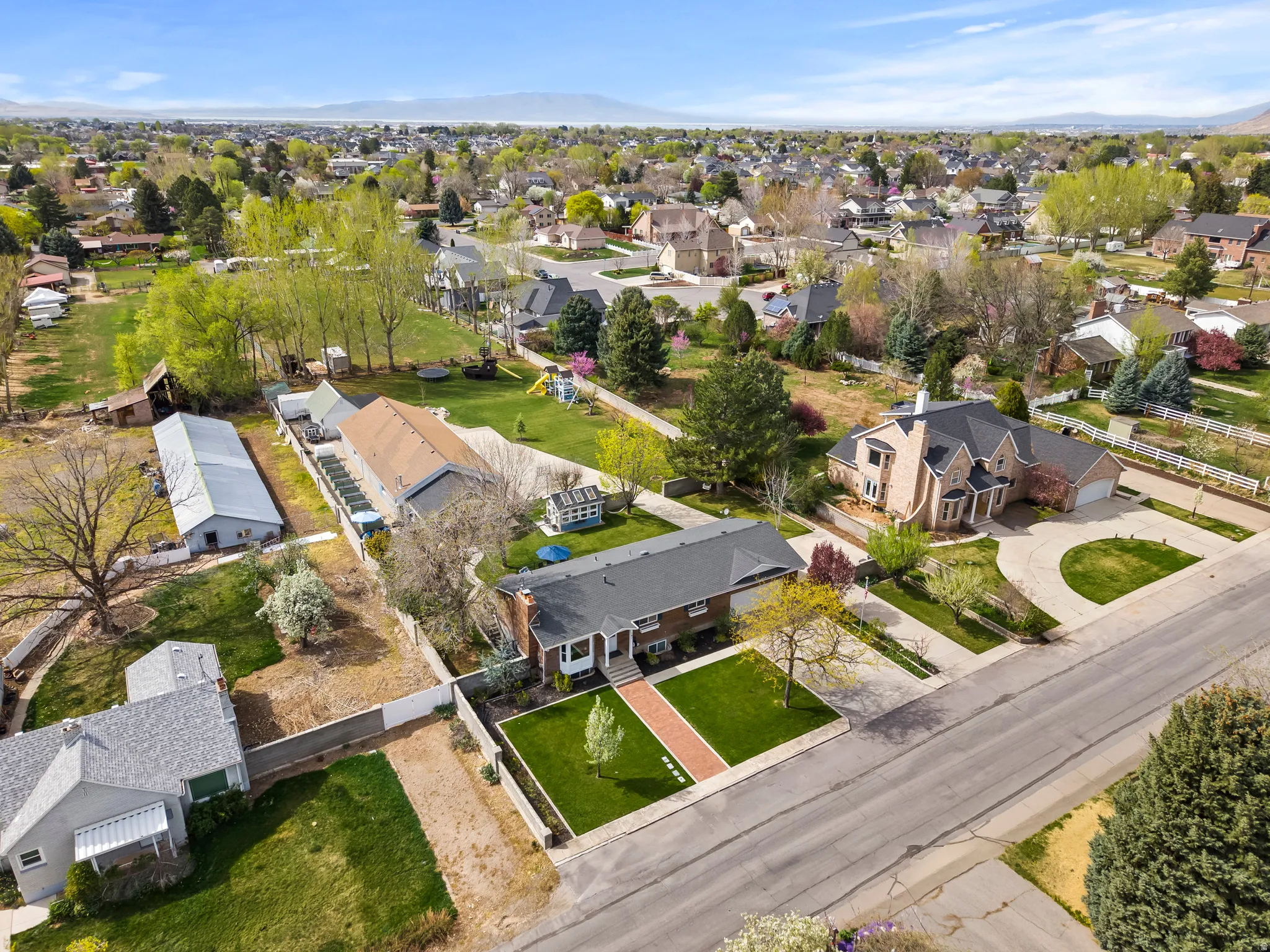 Aerial view of of the .88 acre residential property.
