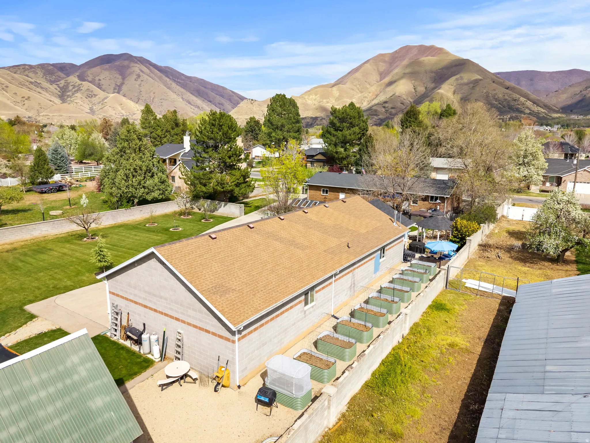 Aerial view of residential area with a mountainous background