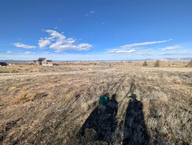 View of yard with a rural view