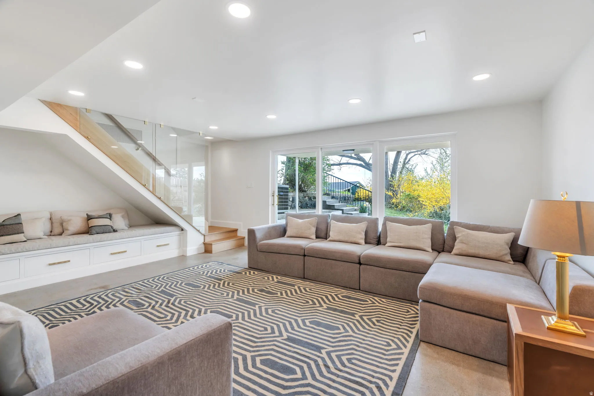 Basement rec room has lots of natural light
