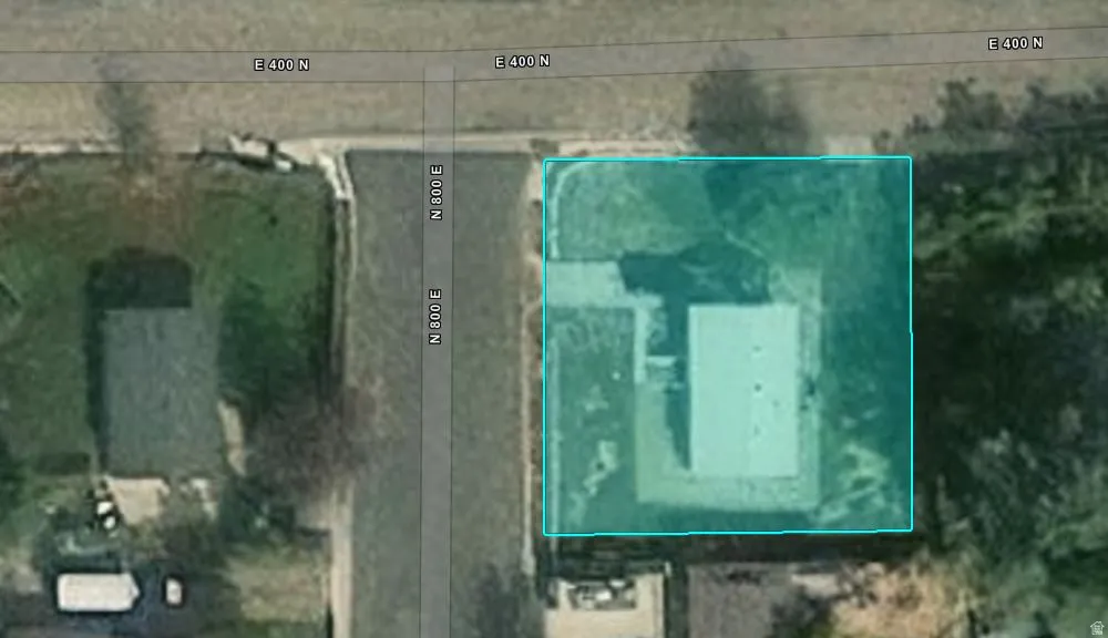Aerial map of property and surrounding area featuring property parcel outlined