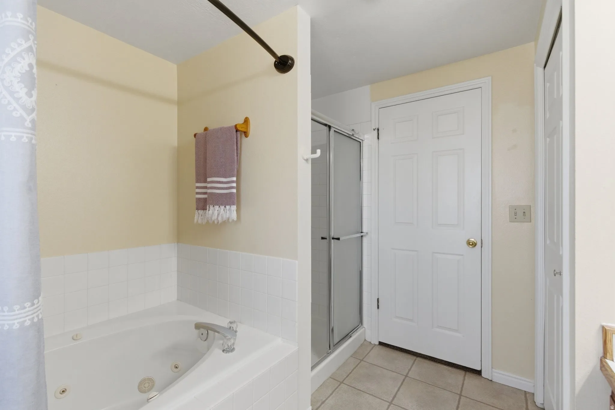 Full bath with separate shower and relaxing jetted tub,
