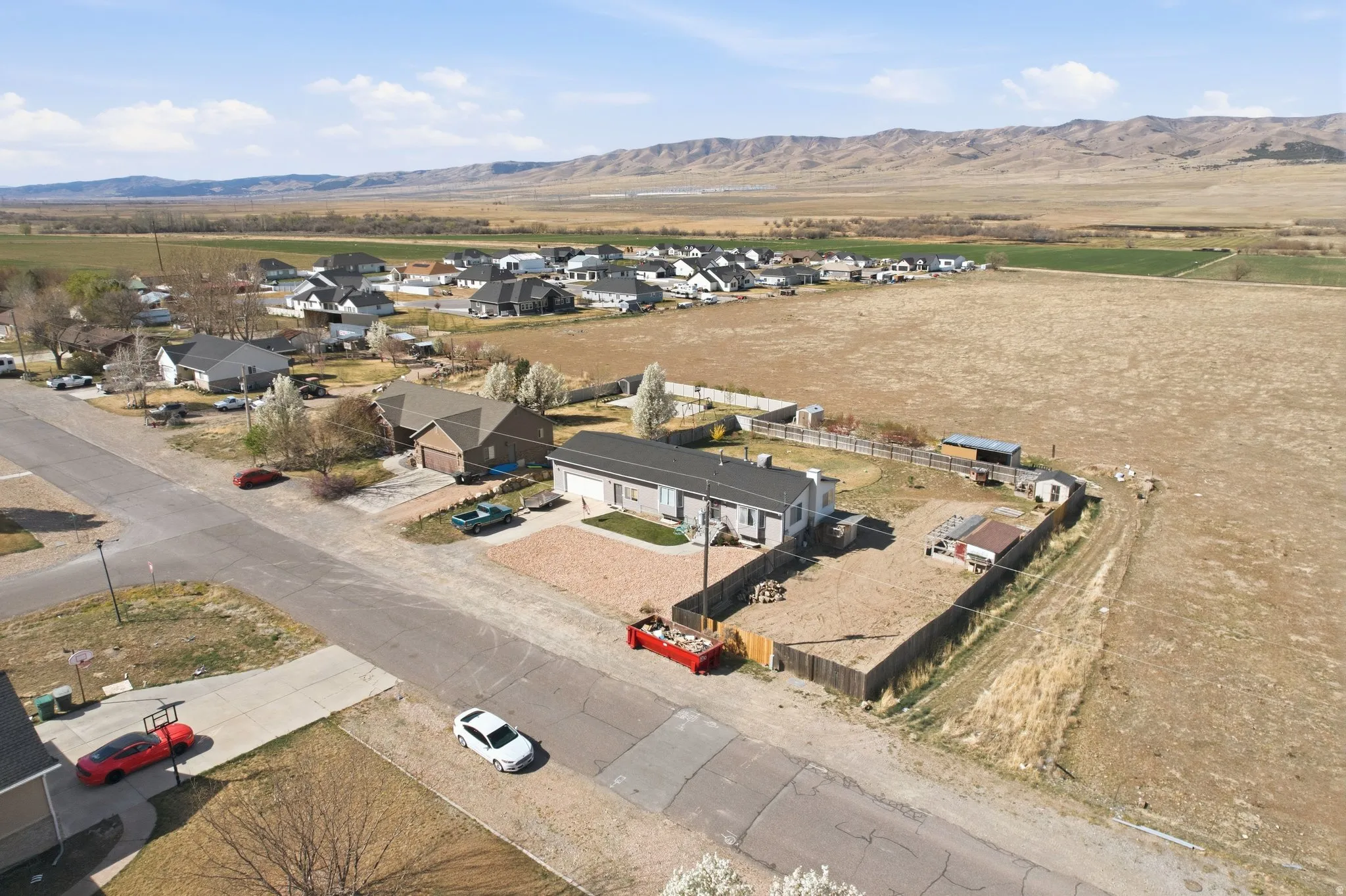 Imagine waking up to wide-open skies, peaceful fields, and beautiful mountain views just beyond your backyard.  This home sits in a quiet rural community where there’s room to breathe, neighbors nearby, and the simple beauty of country living all around