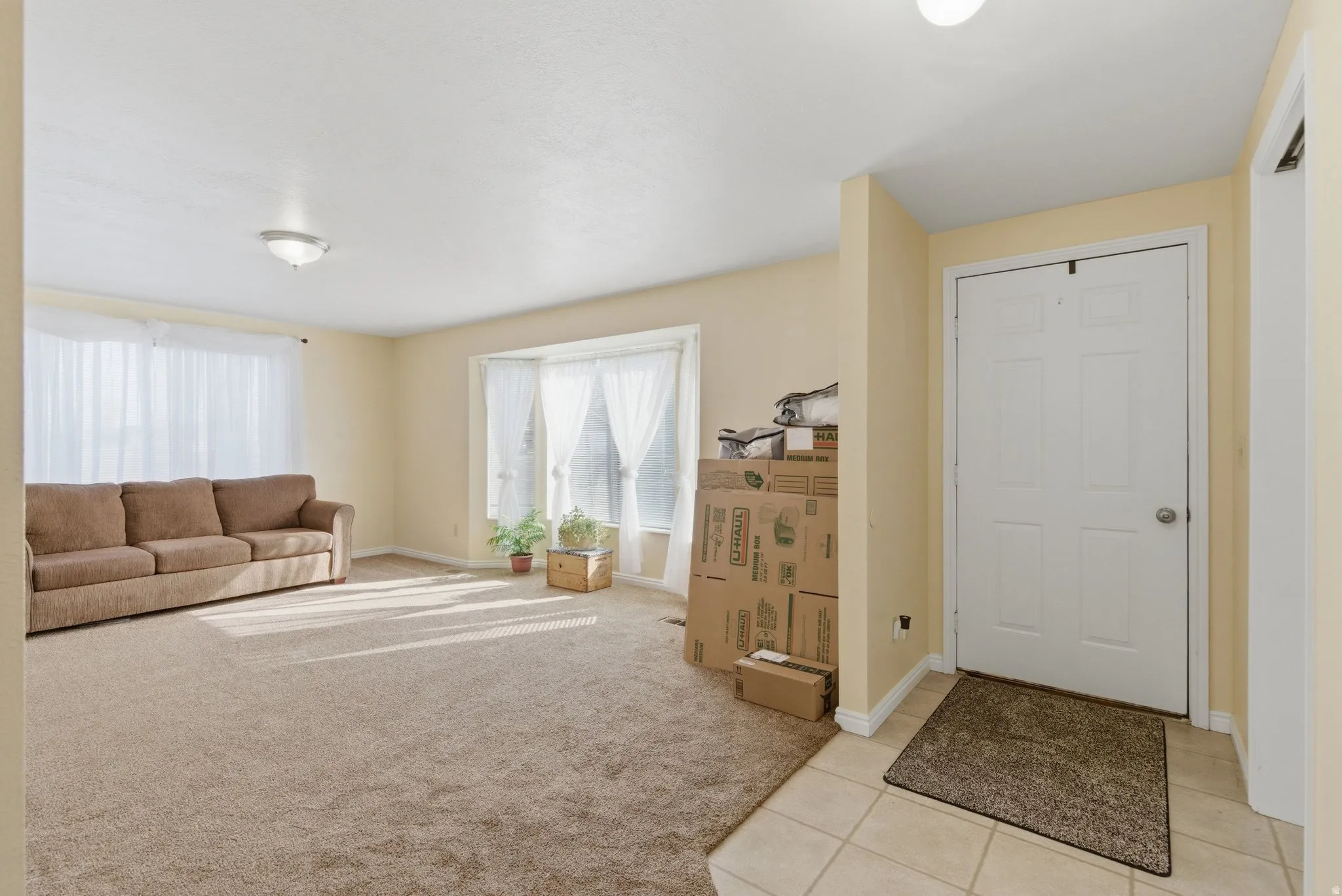 Entry to the Living area featuring  lights of light and beautiful mountain views.
