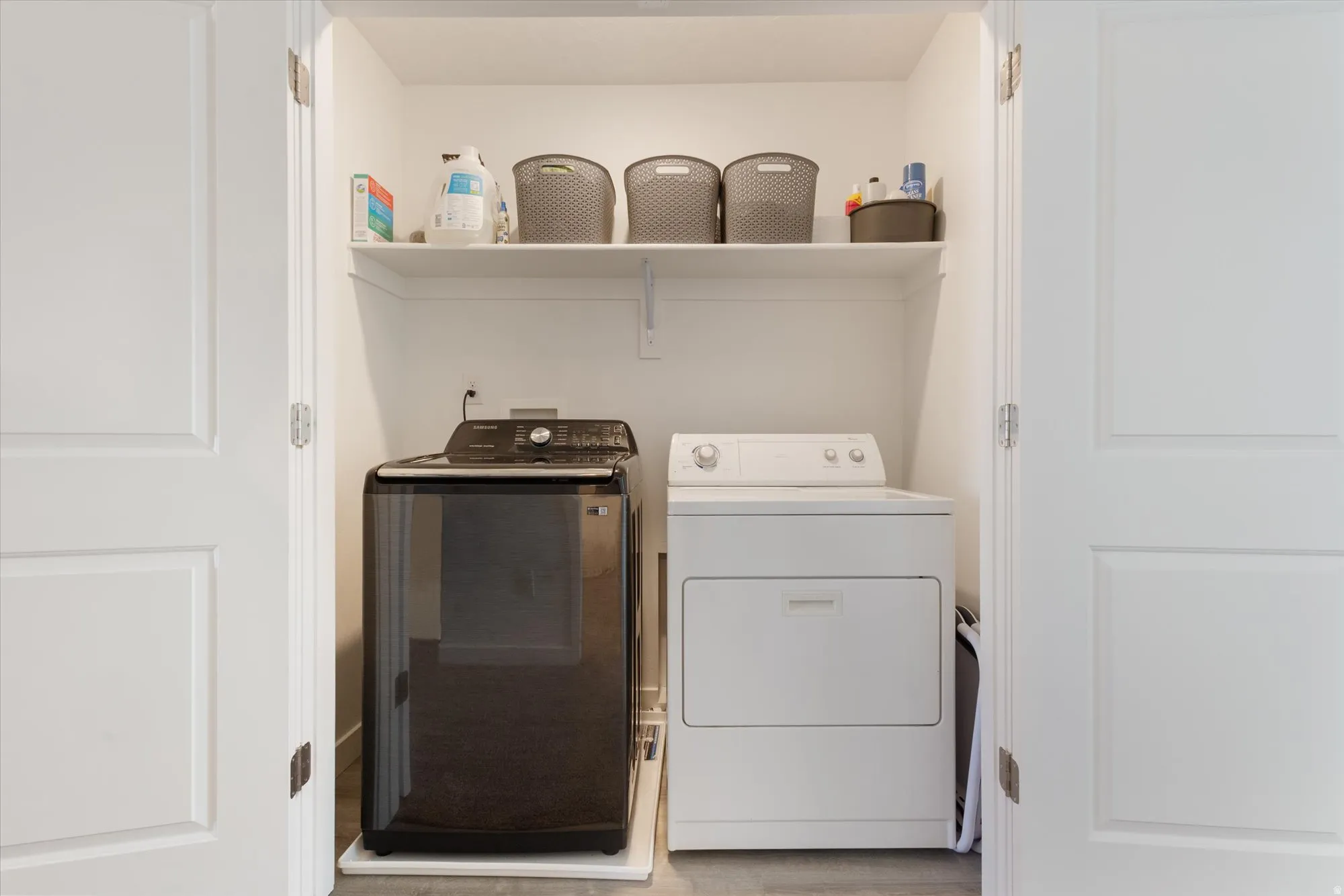 Laundry area featuring independent washer and dryer