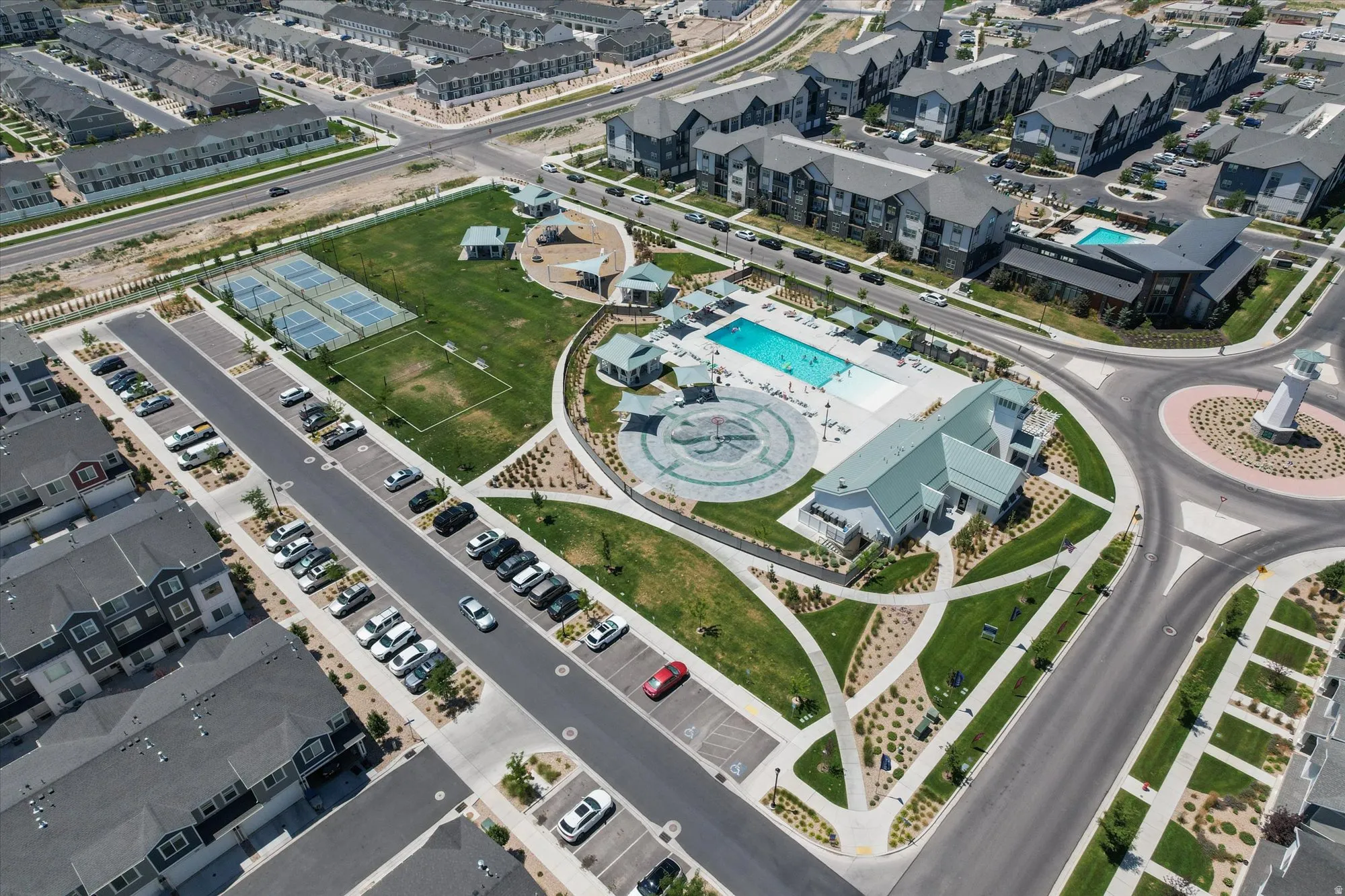 Aerial overview of property's location with a pool area