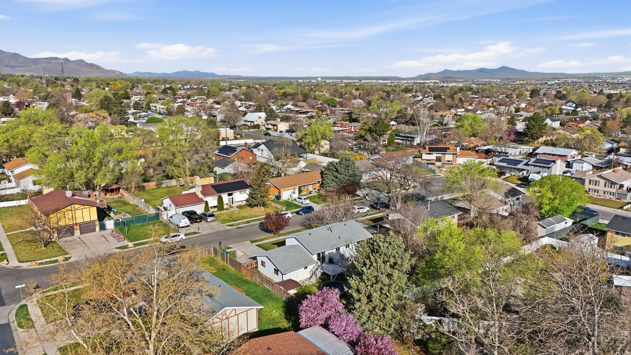 Aerial perspective of suburban area with mountains