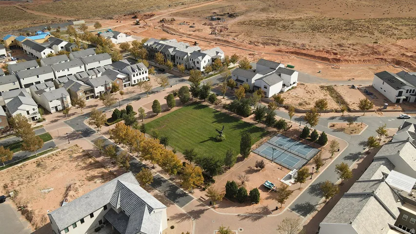 Aerial overview of property's location featuring nearby suburban area