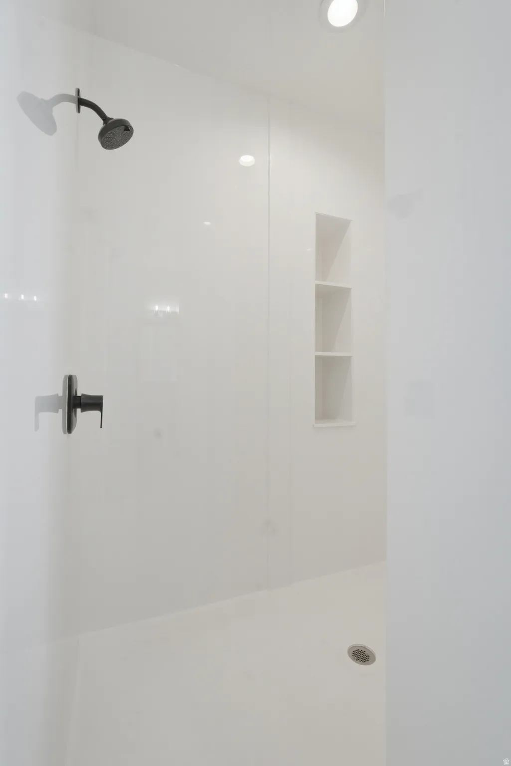 Primary bath shower with dual shower heads