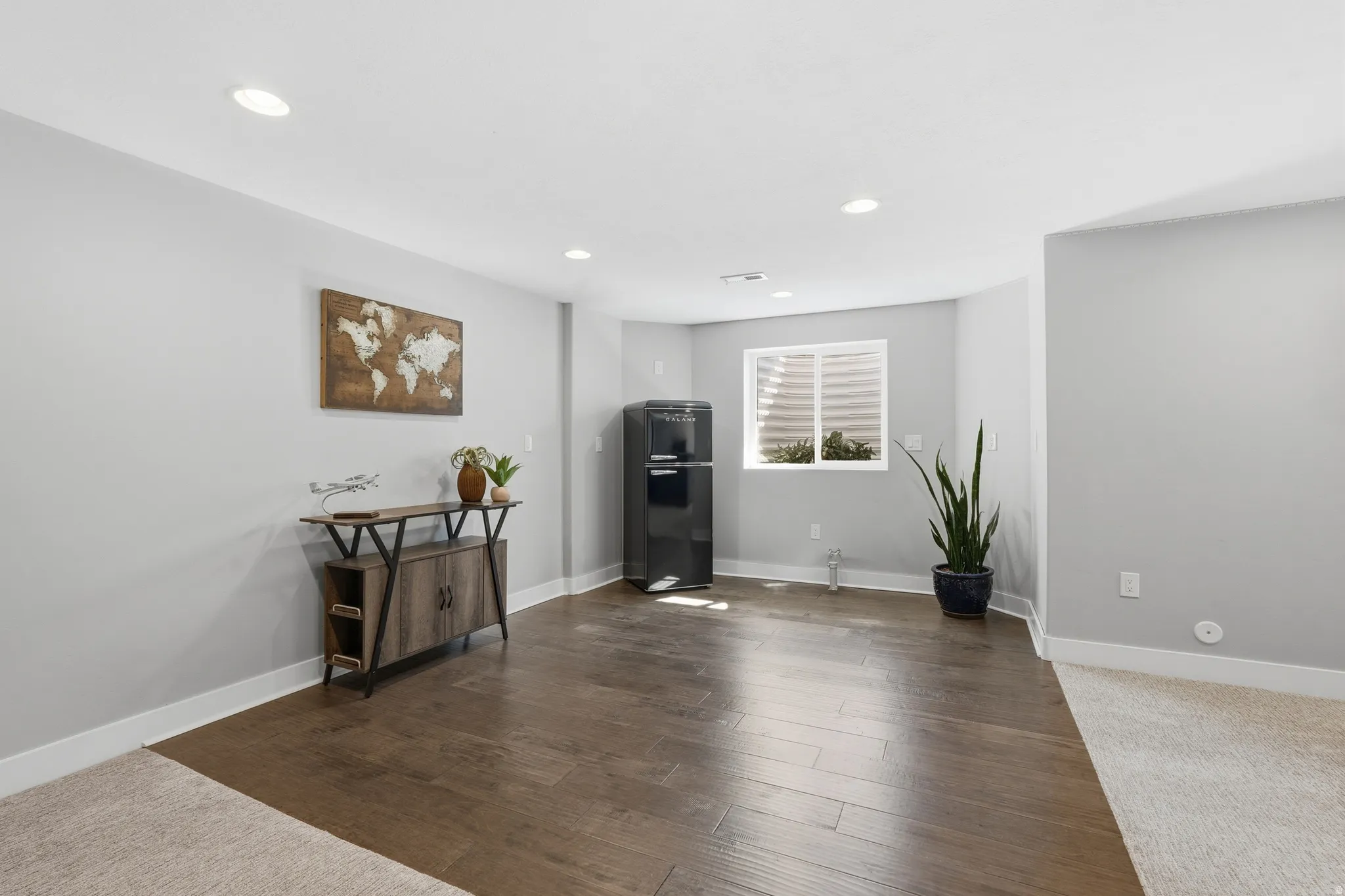 Hardwood area stubbed for kitchen in basement