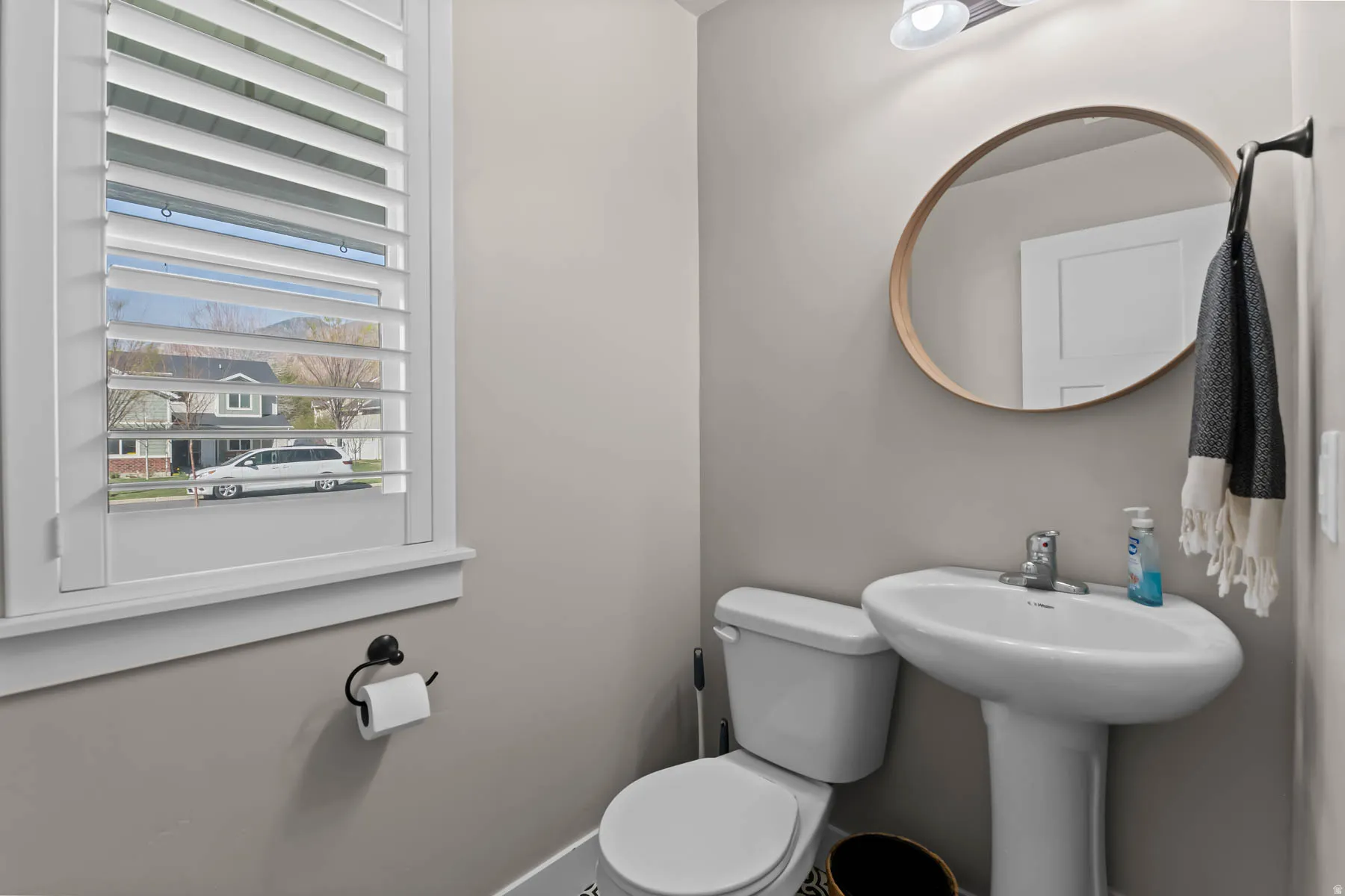 Half bath with toilet and a sink