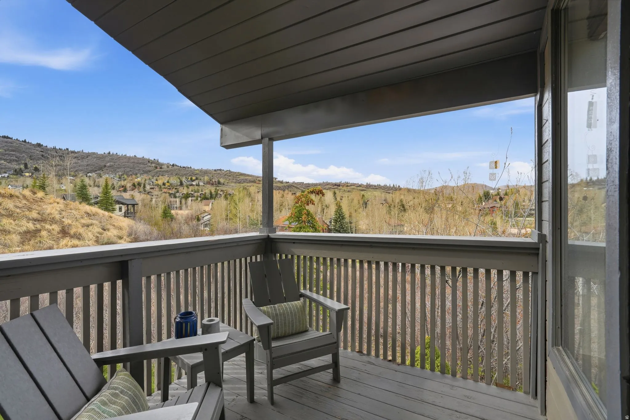 Wooden deck featuring a mountain view