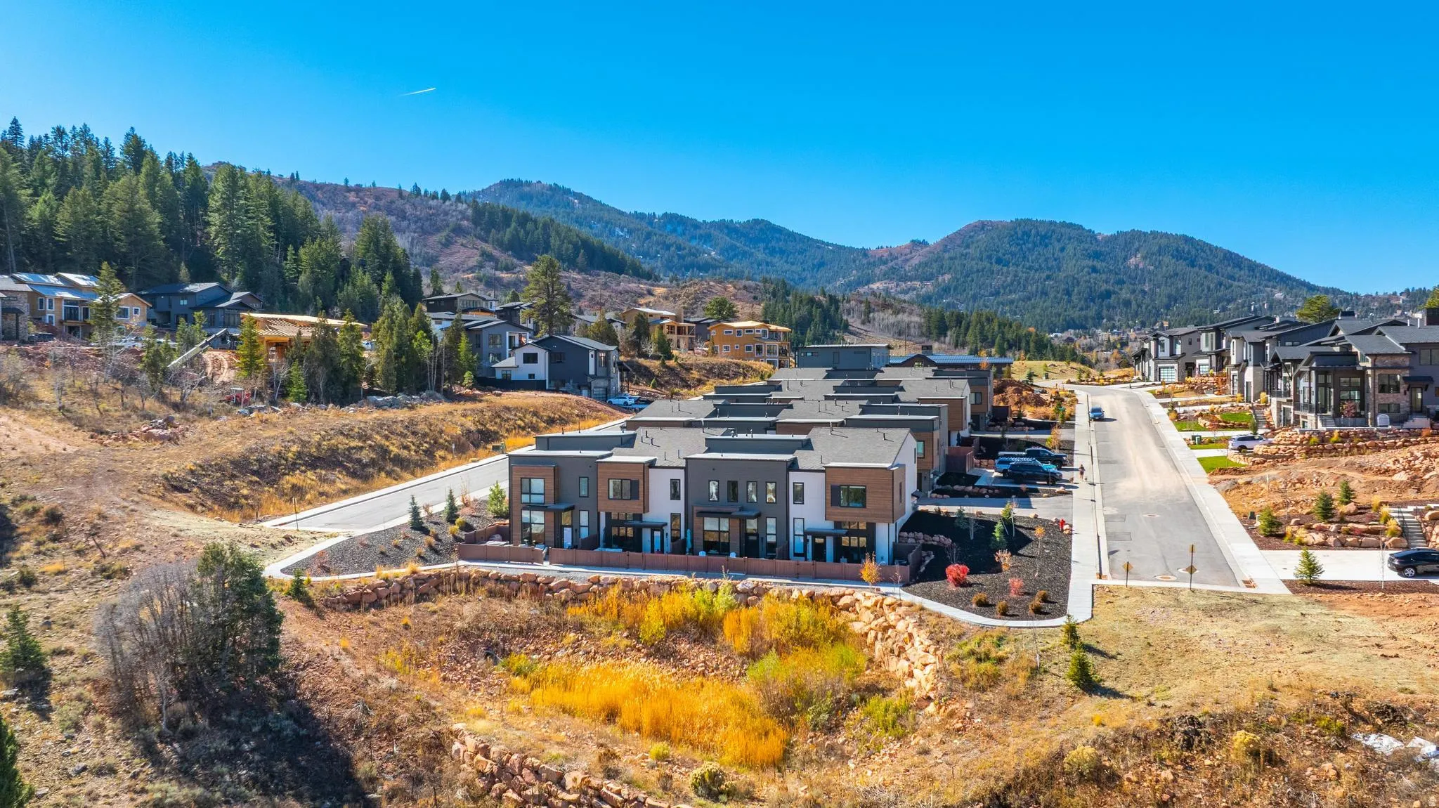 Rear view of house with a residential view and a mountain view