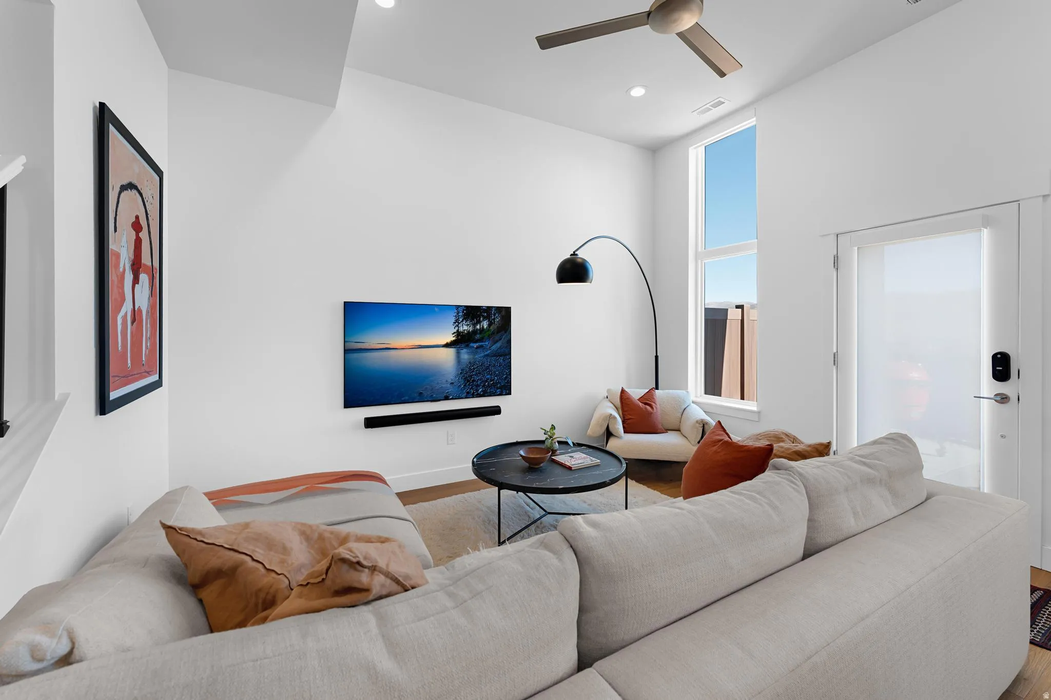 Living room featuring ceiling fan, recessed lighting, and wood finished floors