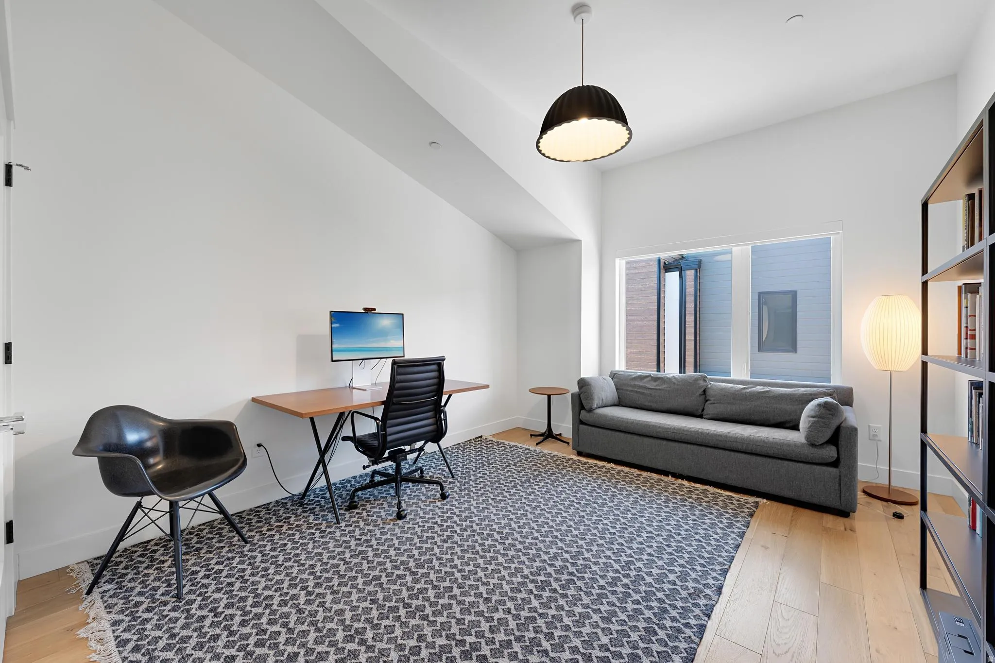 Office with light wood-style floors