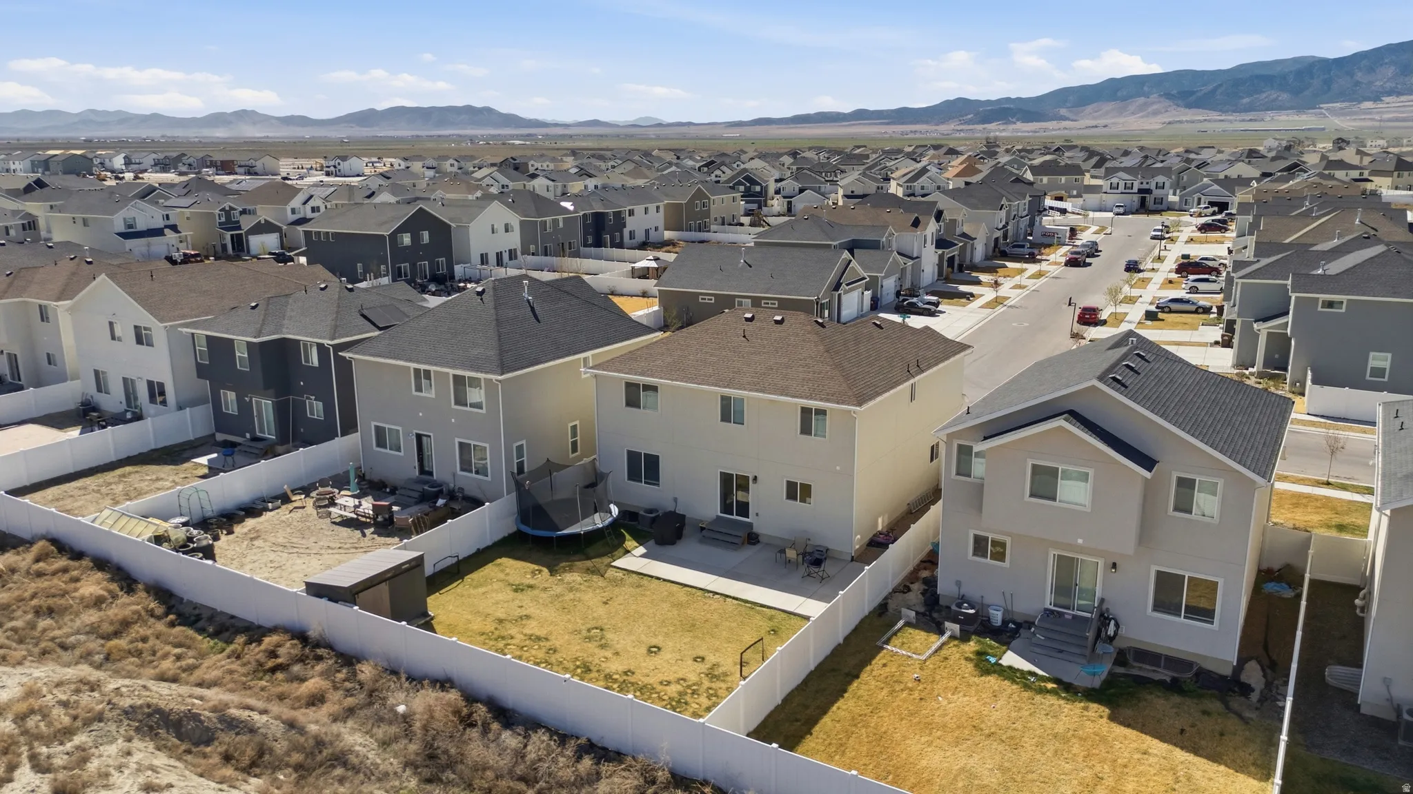 Aerial perspective of suburban area featuring mountains