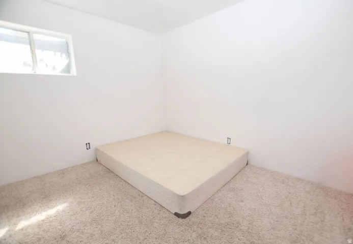 Bedroom with carpet