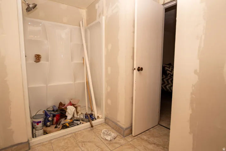 Full bathroom with a stall shower