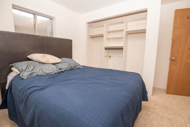 Bedroom featuring carpet