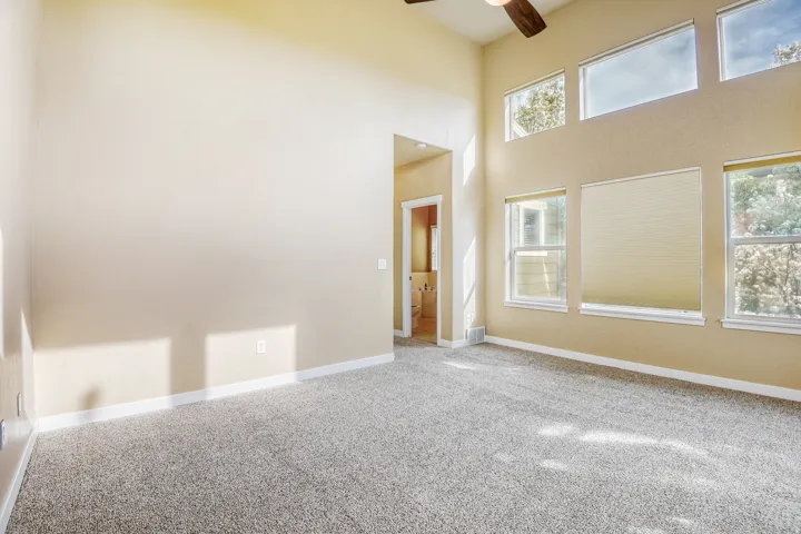 Primary Bedroom w new carpet and en suite bathroom