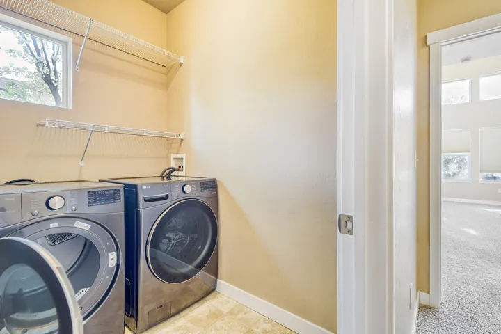 Laundry room w New LG washer and dryer