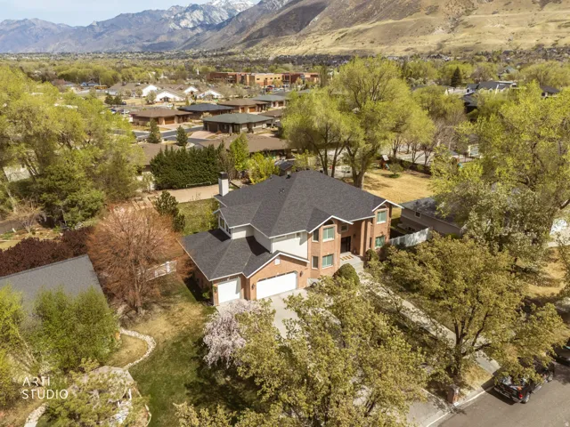Aerial view of residential area featuring mountains