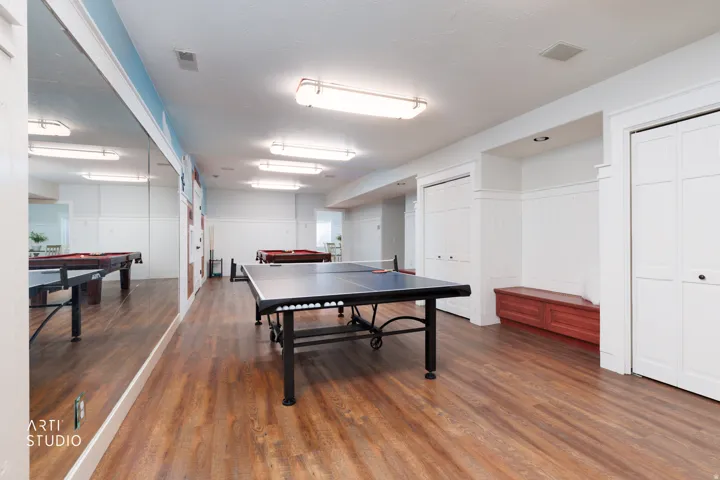 Playroom featuring wainscoting and pool table