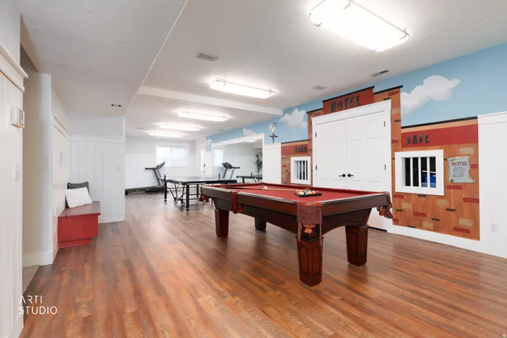 Playroom featuring billiards and wood finished floors