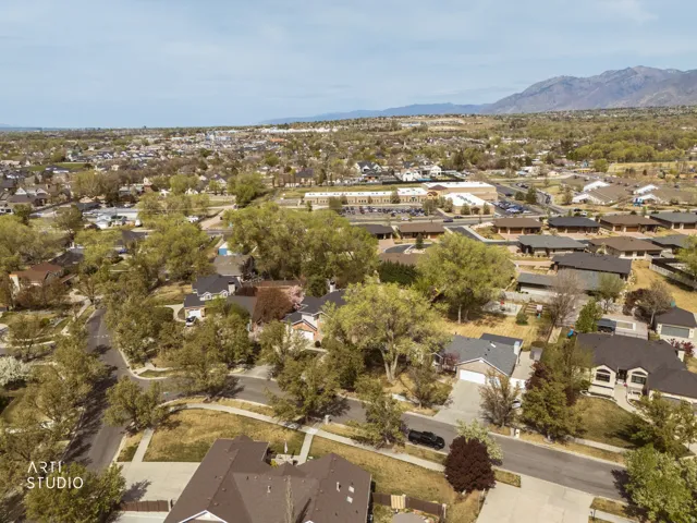 View of property location with nearby suburban area and a mountain backdrop