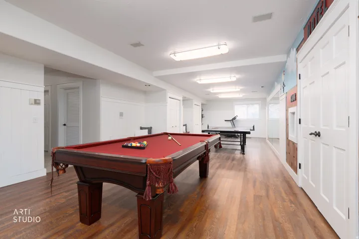 Recreation room featuring wood finished floors and billiards table
