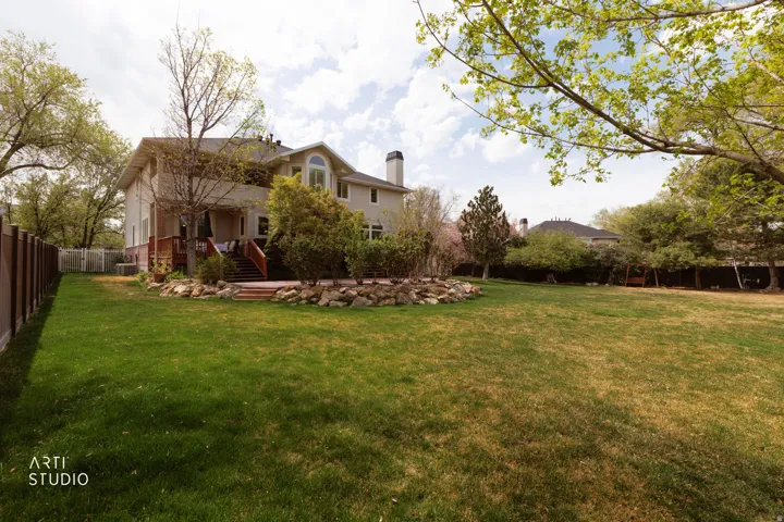 View of fenced backyard