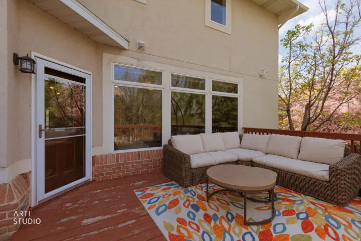 Wooden deck featuring an outdoor hangout area