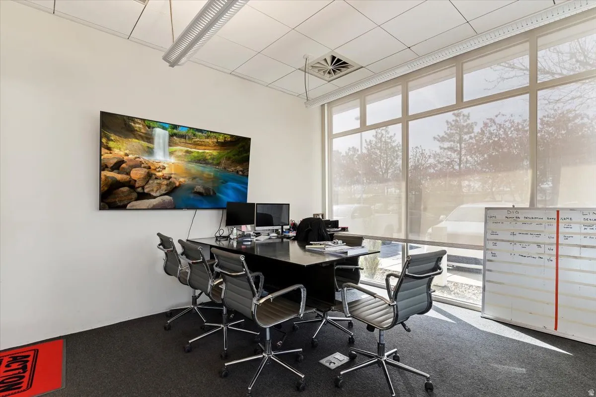 Home office featuring expansive windows