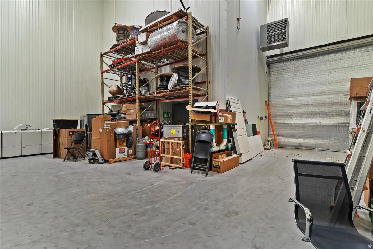 Garage featuring metal wall