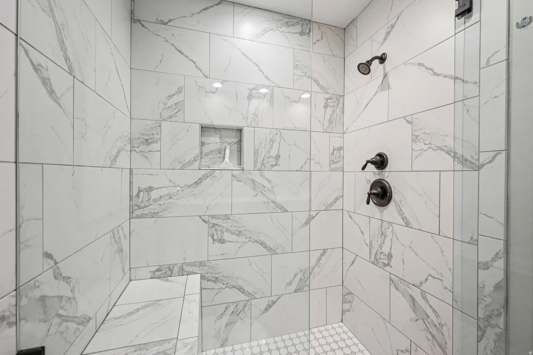 Bathroom with a tile shower