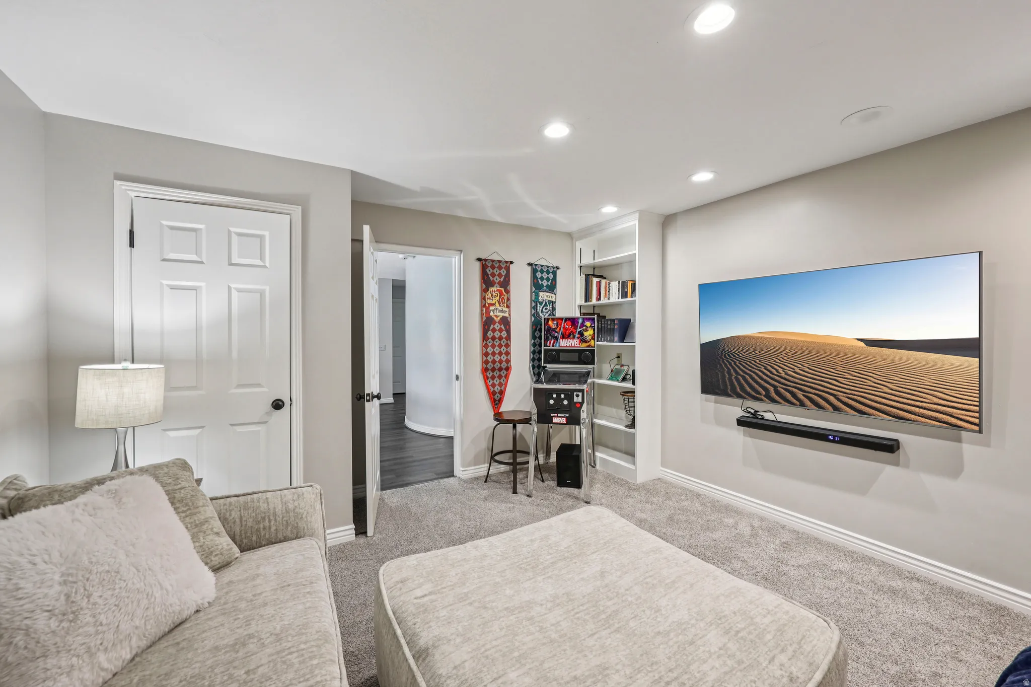 Bedroom with light carpet and recessed lighting