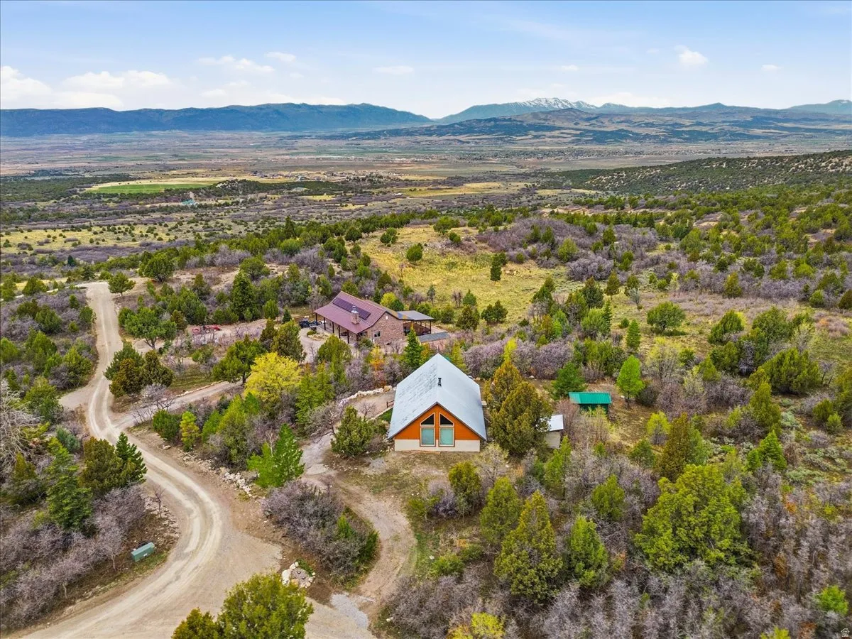 View from above of property with a mountainous background