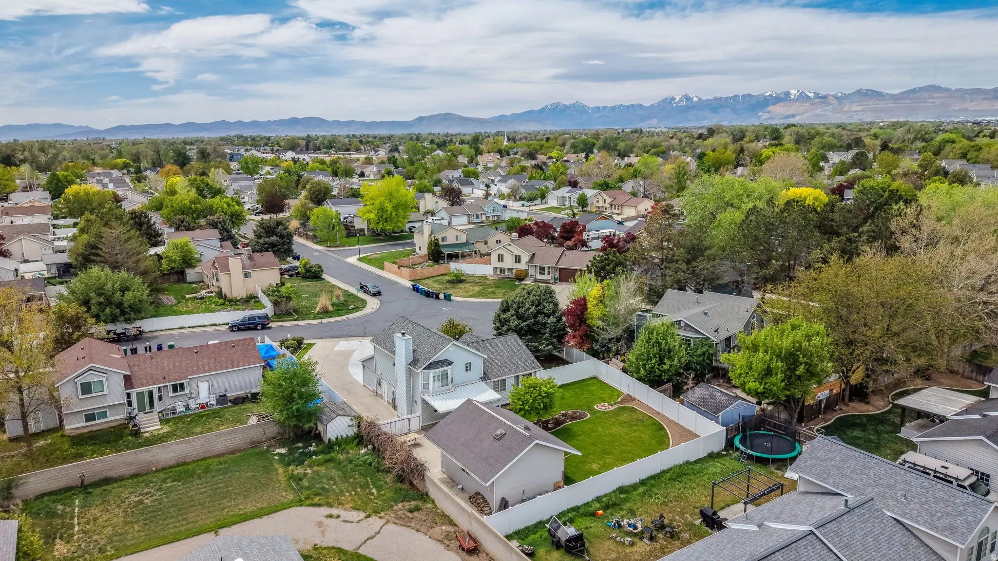 Aerial view of residential area with a mountain backdrop