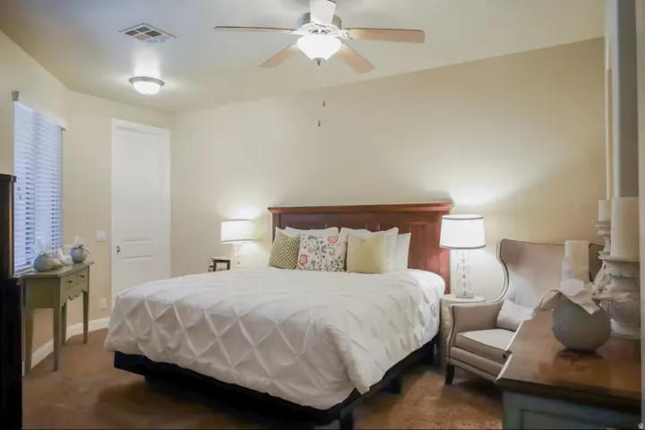 Bedroom with carpet flooring and ceiling fan
