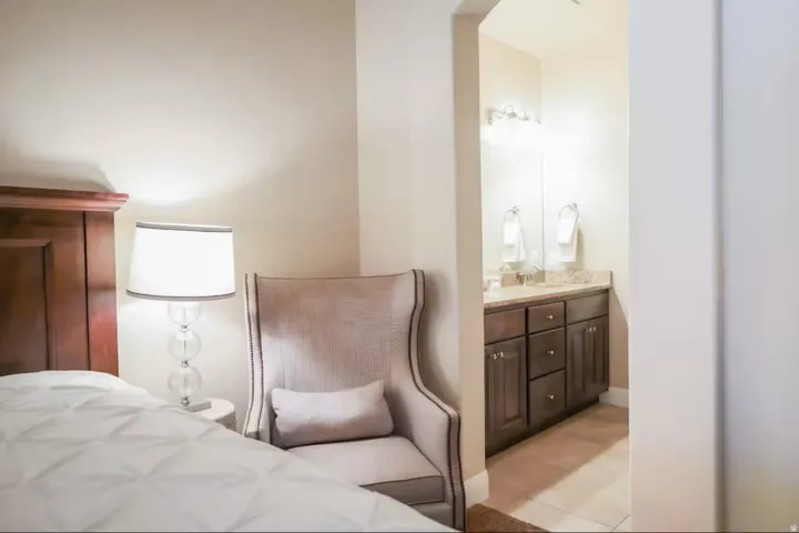Bedroom featuring ensuite bath