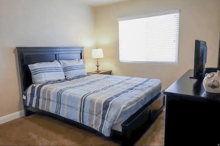 Bedroom with baseboards