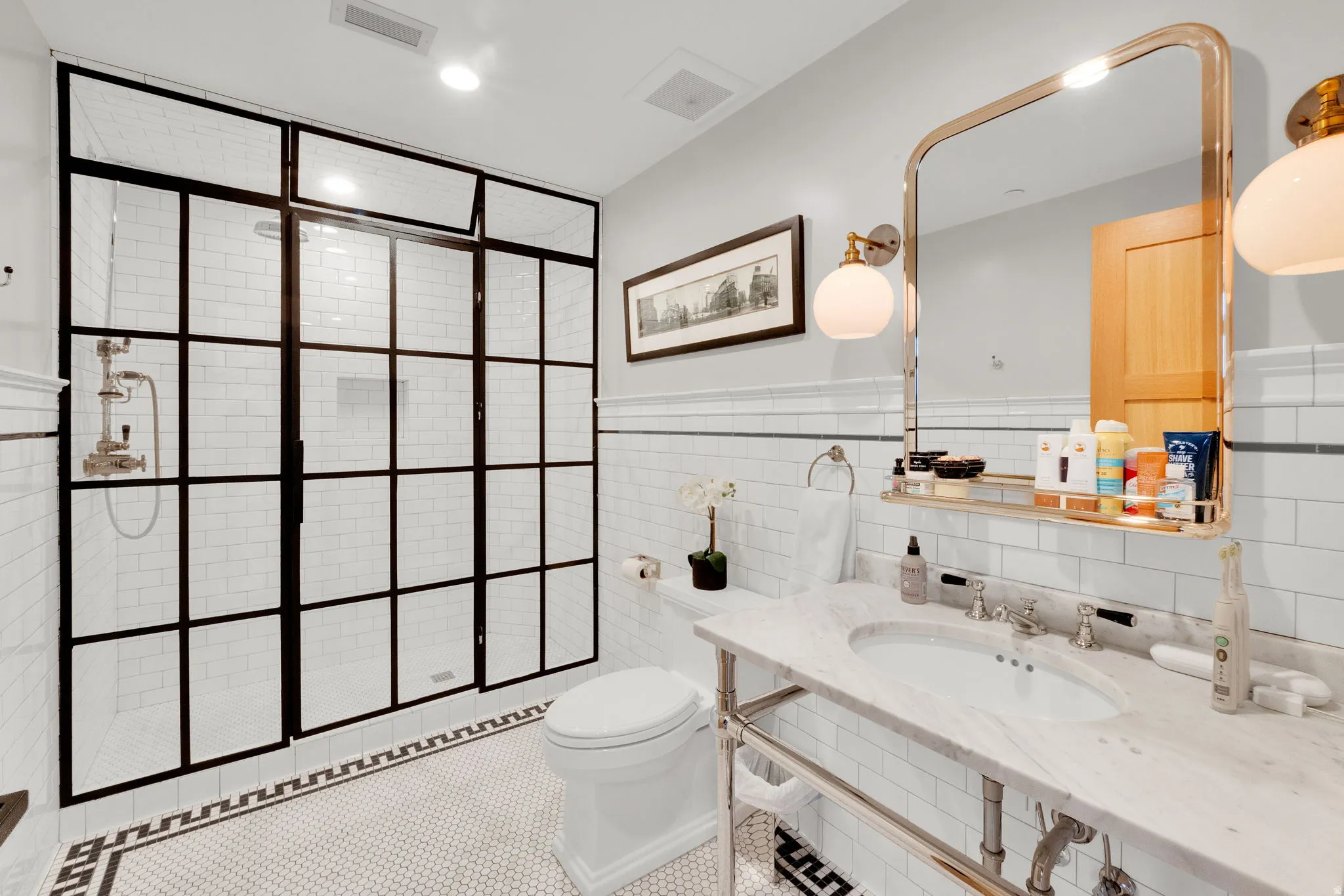 Full bathroom with tile walls, walk in shower, recessed lighting, tile patterned flooring, and a wainscoted wall