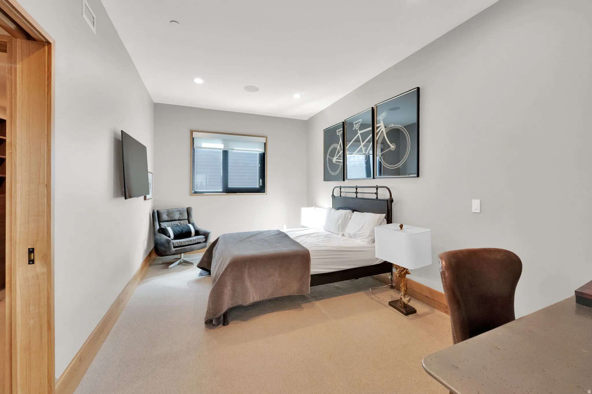 Bedroom featuring light colored carpet and recessed lighting