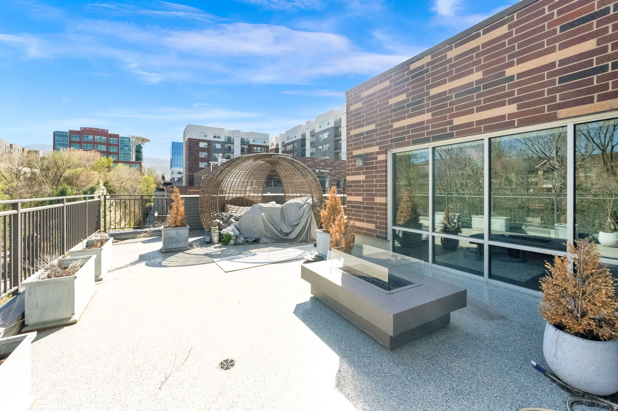 Private wrap around patio. View of patio / terrace with an outdoor fire pit