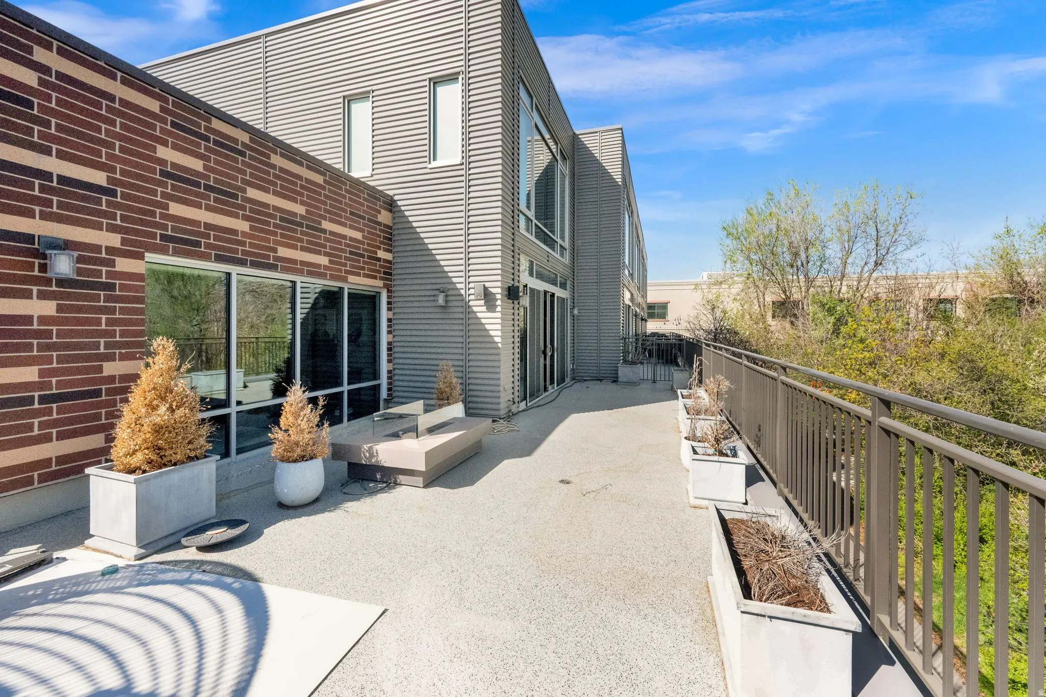 Rear view of house with a patio area